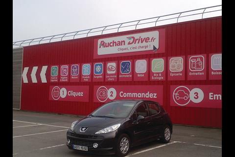Auchan Drive.fr links to a a click-and-collect warehouse, across the car park, which had a steady stream of digital shoppers.